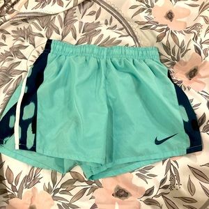 Teal Nike shorts for children